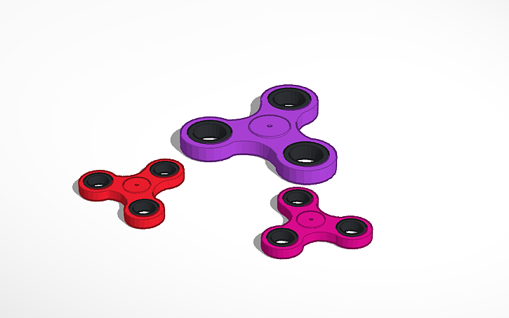 Purple, red, and pink fidget spinners.