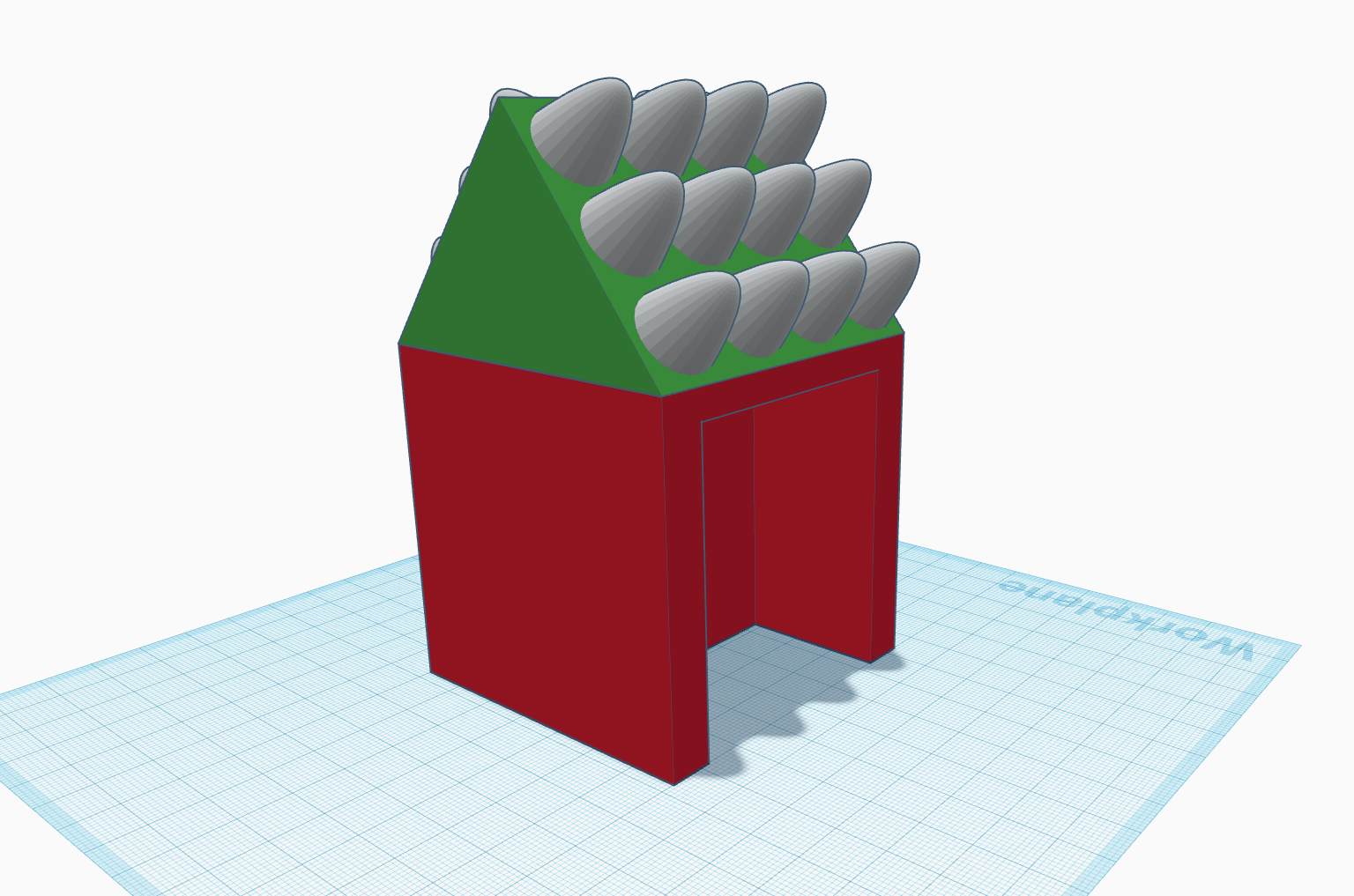 A red base and a green roof with white drops.