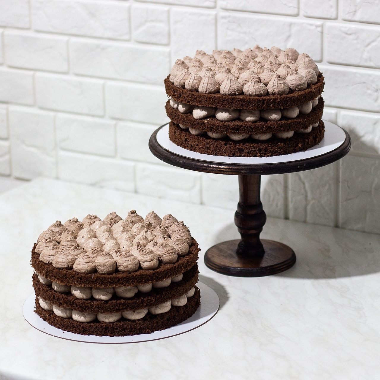 A simple, naked chocolate cake with chocolate buttercream.