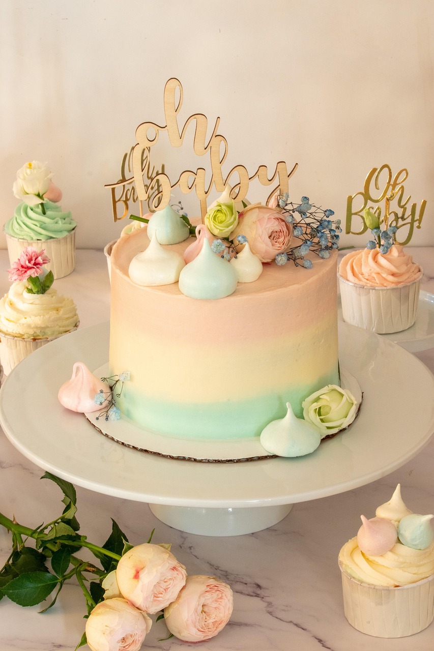 A pastel ombre cake with embellishments.